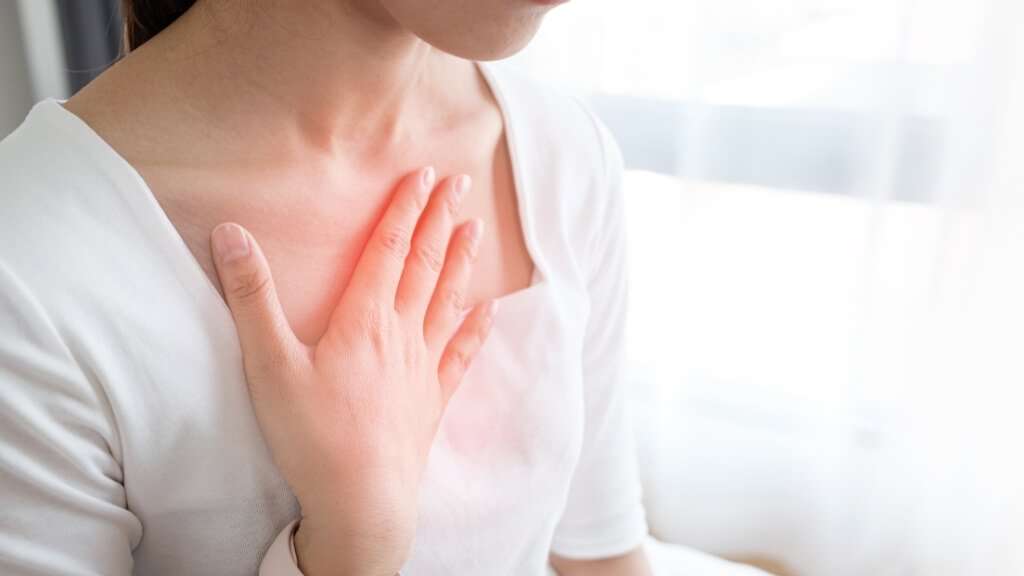 woman experiencing acid reflux and indigestion in pregnancy