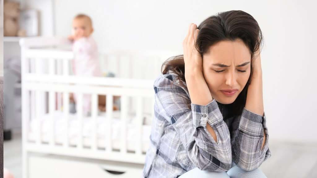 mother suffering from postnatal depression